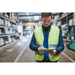 Image of man in safety vest looking at iPad