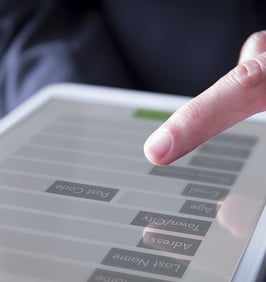 Image of someone typing on phone screen