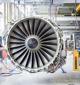 Image showing a jet engine with a control pendant being repaired.
