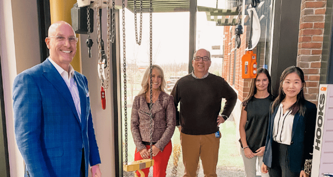 Image of group of people smiling at the camera
