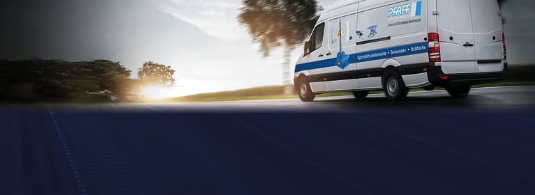 Image of Pfaff-silberblau van driving down the road