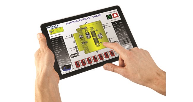 Image of someone holding an iPad with Intelli Guide "Automated Billet Crane" on screen